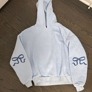 Light Blue Hoodie with Bow Accents